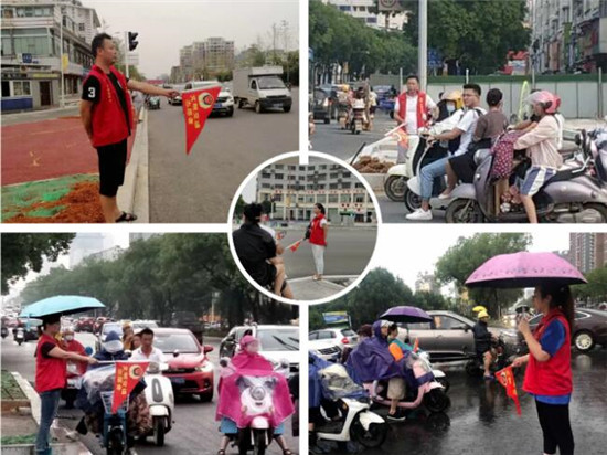 团市委书记徐新颖带领干部职工站好交通志愿岗