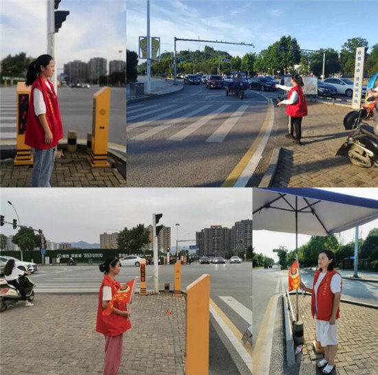 团市委书记徐新颖带领干部职工站好交通志愿岗